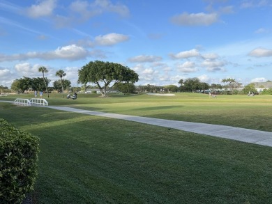 Panoramic views of golf course, and lake from this nicely on Kings Point Golf - Executive in Florida - for sale on GolfHomes.com, golf home, golf lot