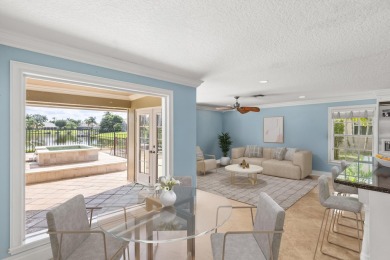 Enjoy lakefront sunsets from this elegant home in the gated on Greenview Cove Golf Club in Florida - for sale on GolfHomes.com, golf home, golf lot