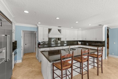 Enjoy lakefront sunsets from this elegant home in the gated on Greenview Cove Golf Club in Florida - for sale on GolfHomes.com, golf home, golf lot