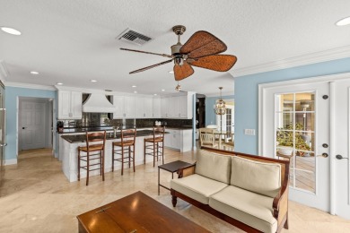 Enjoy lakefront sunsets from this elegant home in the gated on Greenview Cove Golf Club in Florida - for sale on GolfHomes.com, golf home, golf lot