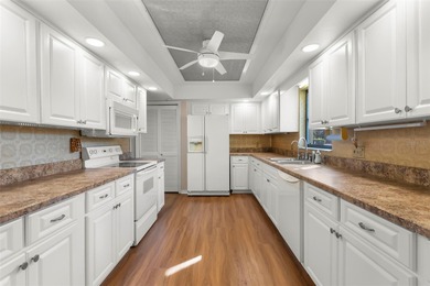 Spaciousness and privacy!  Welcome home to your 3 bedroom, 2.5 on Tarpon Woods Golf Club in Florida - for sale on GolfHomes.com, golf home, golf lot