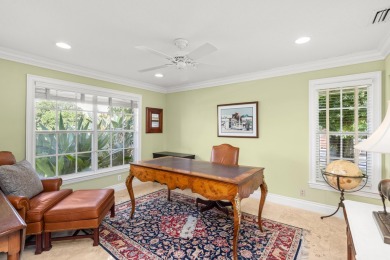 Enjoy lakefront sunsets from this elegant home in the gated on Greenview Cove Golf Club in Florida - for sale on GolfHomes.com, golf home, golf lot
