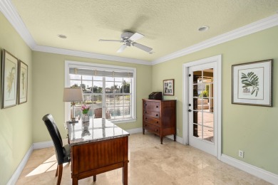Enjoy lakefront sunsets from this elegant home in the gated on Greenview Cove Golf Club in Florida - for sale on GolfHomes.com, golf home, golf lot