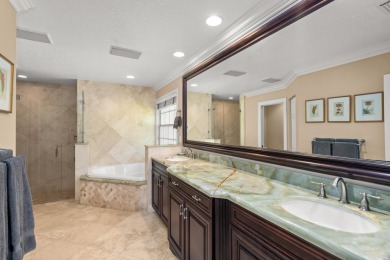 Enjoy lakefront sunsets from this elegant home in the gated on Greenview Cove Golf Club in Florida - for sale on GolfHomes.com, golf home, golf lot