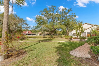 Spaciousness and privacy!  Welcome home to your 3 bedroom, 2.5 on Tarpon Woods Golf Club in Florida - for sale on GolfHomes.com, golf home, golf lot