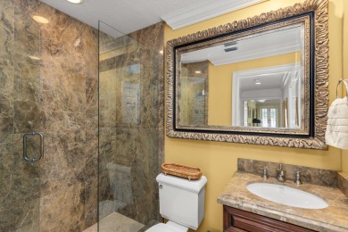 Enjoy lakefront sunsets from this elegant home in the gated on Greenview Cove Golf Club in Florida - for sale on GolfHomes.com, golf home, golf lot