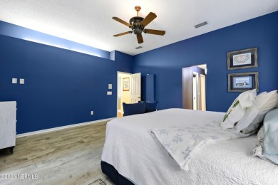 This beautiful brick home is ideal for multi-generational living on Windsor Parke Golf Club in Florida - for sale on GolfHomes.com, golf home, golf lot