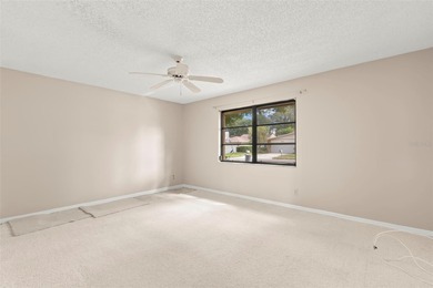 Spaciousness and privacy!  Welcome home to your 3 bedroom, 2.5 on Tarpon Woods Golf Club in Florida - for sale on GolfHomes.com, golf home, golf lot