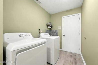 This beautiful brick home is ideal for multi-generational living on Windsor Parke Golf Club in Florida - for sale on GolfHomes.com, golf home, golf lot
