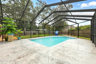 This beautiful brick home is ideal for multi-generational living on Windsor Parke Golf Club in Florida - for sale on GolfHomes.com, golf home, golf lot