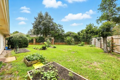 This beautiful brick home is ideal for multi-generational living on Windsor Parke Golf Club in Florida - for sale on GolfHomes.com, golf home, golf lot