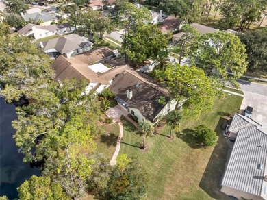 Spaciousness and privacy!  Welcome home to your 3 bedroom, 2.5 on Tarpon Woods Golf Club in Florida - for sale on GolfHomes.com, golf home, golf lot