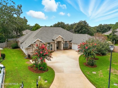 This beautiful brick home is ideal for multi-generational living on Windsor Parke Golf Club in Florida - for sale on GolfHomes.com, golf home, golf lot