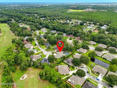 This beautiful brick home is ideal for multi-generational living on Windsor Parke Golf Club in Florida - for sale on GolfHomes.com, golf home, golf lot