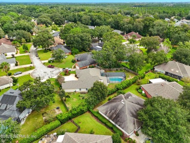 This beautiful brick home is ideal for multi-generational living on Windsor Parke Golf Club in Florida - for sale on GolfHomes.com, golf home, golf lot