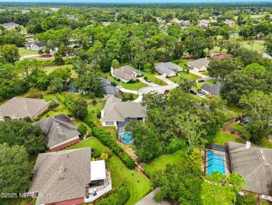 This beautiful brick home is ideal for multi-generational living on Windsor Parke Golf Club in Florida - for sale on GolfHomes.com, golf home, golf lot