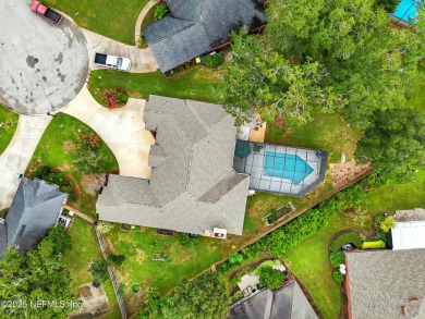 This beautiful brick home is ideal for multi-generational living on Windsor Parke Golf Club in Florida - for sale on GolfHomes.com, golf home, golf lot