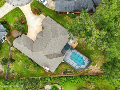 This beautiful brick home is ideal for multi-generational living on Windsor Parke Golf Club in Florida - for sale on GolfHomes.com, golf home, golf lot