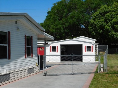 This charming 3-bedroom, 2-bath home in the desirable Betmar on Betmar Acres Golf Club in Florida - for sale on GolfHomes.com, golf home, golf lot