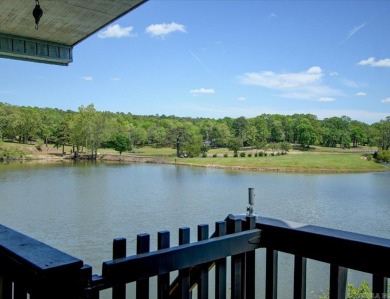 Discover your dream home that boasts breathtaking lake and golf on Diamondhead Golf and Country Club in Arkansas - for sale on GolfHomes.com, golf home, golf lot
