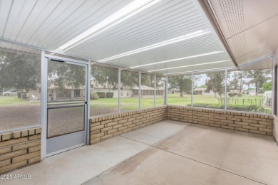 Welcome to this delightful home situated on a quiet, tree-lined on PalmBrook Country Club in Arizona - for sale on GolfHomes.com, golf home, golf lot