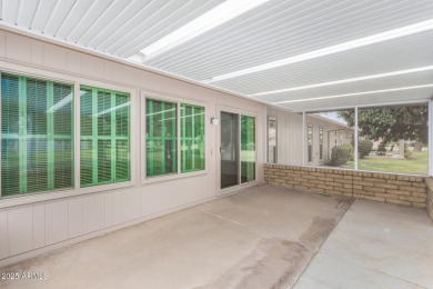 Welcome to this delightful home situated on a quiet, tree-lined on PalmBrook Country Club in Arizona - for sale on GolfHomes.com, golf home, golf lot