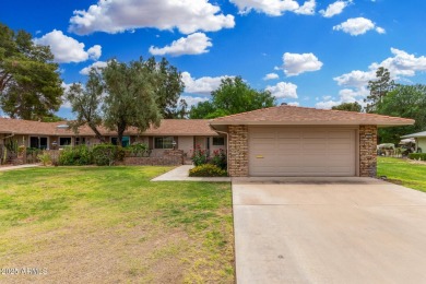 Welcome to this delightful home situated on a quiet, tree-lined on PalmBrook Country Club in Arizona - for sale on GolfHomes.com, golf home, golf lot