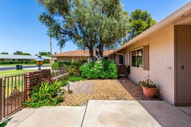 Welcome to this delightful home situated on a quiet, tree-lined on PalmBrook Country Club in Arizona - for sale on GolfHomes.com, golf home, golf lot