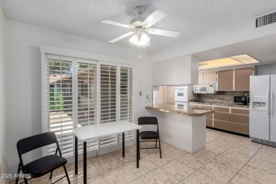 Welcome to this delightful home situated on a quiet, tree-lined on PalmBrook Country Club in Arizona - for sale on GolfHomes.com, golf home, golf lot