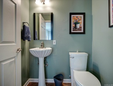Discover your dream home that boasts breathtaking lake and golf on Diamondhead Golf and Country Club in Arkansas - for sale on GolfHomes.com, golf home, golf lot