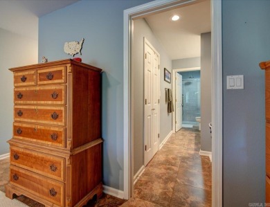 Discover your dream home that boasts breathtaking lake and golf on Diamondhead Golf and Country Club in Arkansas - for sale on GolfHomes.com, golf home, golf lot