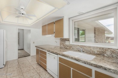 Welcome to this delightful home situated on a quiet, tree-lined on PalmBrook Country Club in Arizona - for sale on GolfHomes.com, golf home, golf lot