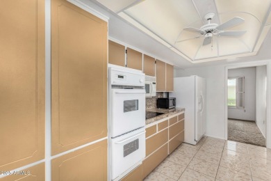 Welcome to this delightful home situated on a quiet, tree-lined on PalmBrook Country Club in Arizona - for sale on GolfHomes.com, golf home, golf lot