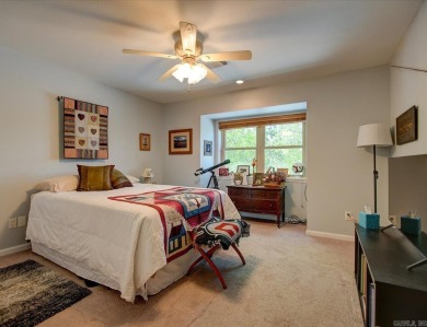 Discover your dream home that boasts breathtaking lake and golf on Diamondhead Golf and Country Club in Arkansas - for sale on GolfHomes.com, golf home, golf lot