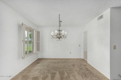Welcome to this delightful home situated on a quiet, tree-lined on PalmBrook Country Club in Arizona - for sale on GolfHomes.com, golf home, golf lot