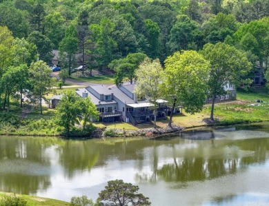 Discover your dream home that boasts breathtaking lake and golf on Diamondhead Golf and Country Club in Arkansas - for sale on GolfHomes.com, golf home, golf lot
