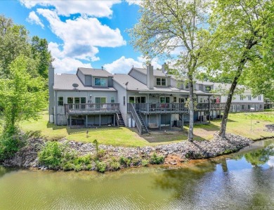 Discover your dream home that boasts breathtaking lake and golf on Diamondhead Golf and Country Club in Arkansas - for sale on GolfHomes.com, golf home, golf lot
