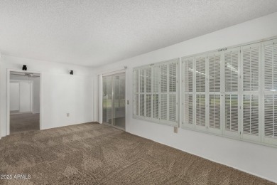 Welcome to this delightful home situated on a quiet, tree-lined on PalmBrook Country Club in Arizona - for sale on GolfHomes.com, golf home, golf lot