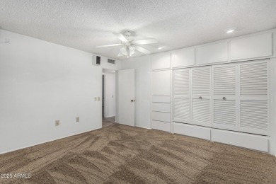 Welcome to this delightful home situated on a quiet, tree-lined on PalmBrook Country Club in Arizona - for sale on GolfHomes.com, golf home, golf lot