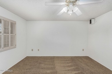 Welcome to this delightful home situated on a quiet, tree-lined on PalmBrook Country Club in Arizona - for sale on GolfHomes.com, golf home, golf lot