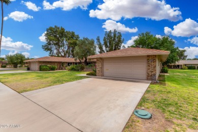 Welcome to this delightful home situated on a quiet, tree-lined on PalmBrook Country Club in Arizona - for sale on GolfHomes.com, golf home, golf lot