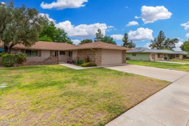 Welcome to this delightful home situated on a quiet, tree-lined on PalmBrook Country Club in Arizona - for sale on GolfHomes.com, golf home, golf lot