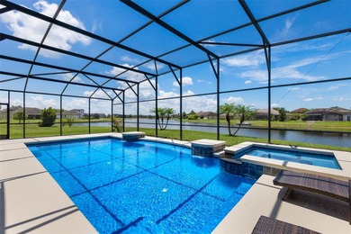 Waterfront home with a private saltwater pool & spa and 3-car on Oaks National Golf Course in Florida - for sale on GolfHomes.com, golf home, golf lot