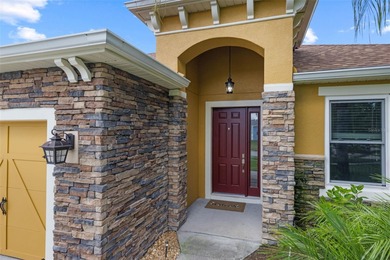 Waterfront home with a private saltwater pool & spa and 3-car on Oaks National Golf Course in Florida - for sale on GolfHomes.com, golf home, golf lot