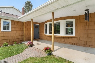 Lakeside living at its finest! Enjoy easy, one-level living in on Lake Lackawanna Golf Course in New Jersey - for sale on GolfHomes.com, golf home, golf lot