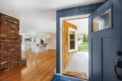 Lakeside living at its finest! Enjoy easy, one-level living in on Lake Lackawanna Golf Course in New Jersey - for sale on GolfHomes.com, golf home, golf lot