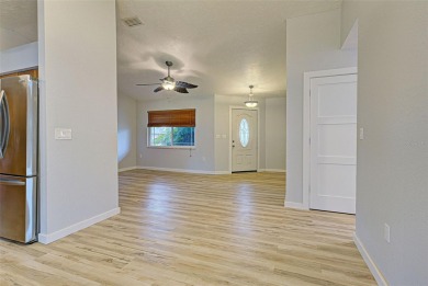 Welcome to this beautifully updated home featuring 3 bedrooms on Jacaranda West Country Club in Florida - for sale on GolfHomes.com, golf home, golf lot