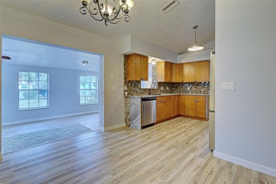 Welcome to this beautifully updated home featuring 3 bedrooms on Jacaranda West Country Club in Florida - for sale on GolfHomes.com, golf home, golf lot