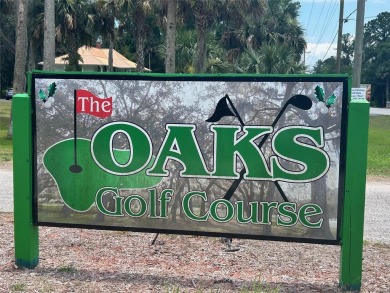 Located in Live Oak Golf and Country Club Estates, is this on The Oaks Golf Club in Florida - for sale on GolfHomes.com, golf home, golf lot