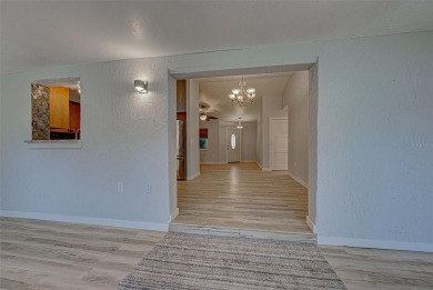 Welcome to this beautifully updated home featuring 3 bedrooms on Jacaranda West Country Club in Florida - for sale on GolfHomes.com, golf home, golf lot